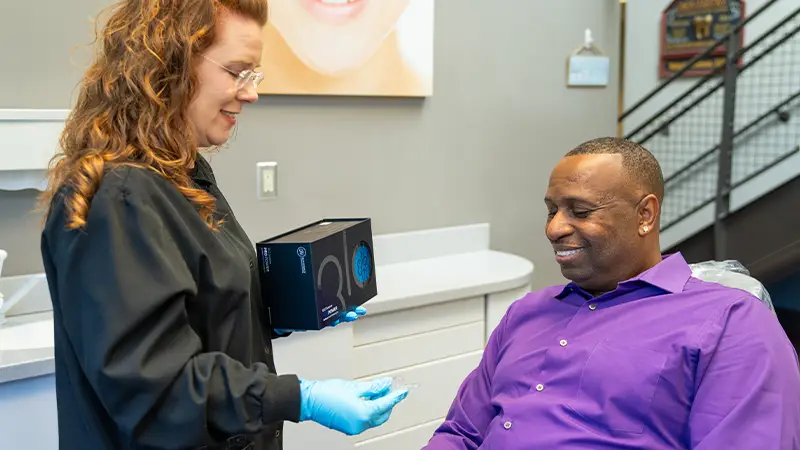 hygienist showing in home option to patient