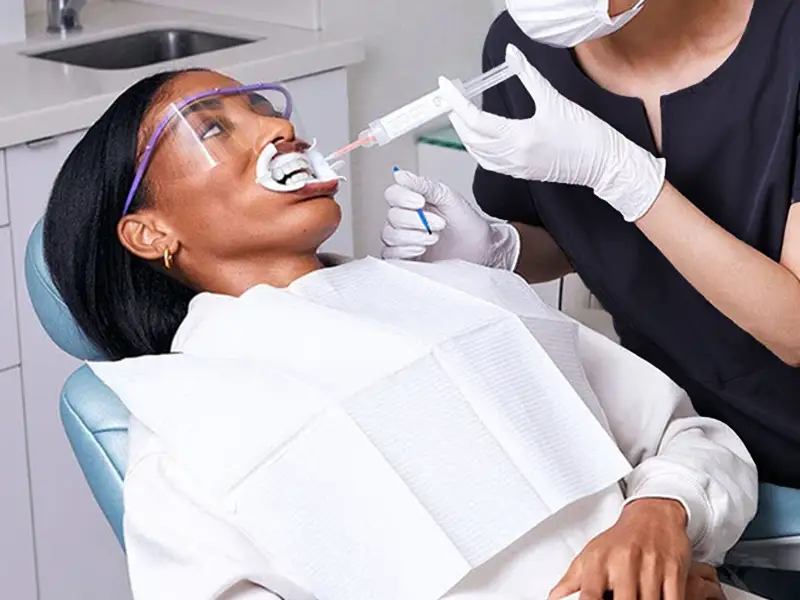 Woman receiving in office treatment